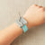 Cocoknits - Makers Keep showing Duck Egg Blue colour on a persons wrist | Yarn Worx