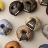 Assorted balls of Isager Mulberry Silk with ISAGER labels on a light background | Yarn Worx