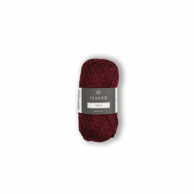 Burgundy skein of linen yarn with a label on a white background