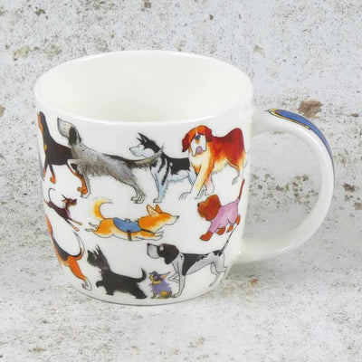 Mug with colorful dog illustrations on a textured surface | Yarn Worx