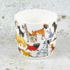 white bone china mug with colourful dog characters | Yarn Worx