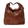 Brown leather bag on a white background | Yarn Worx