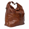 Brown leather roll top handbag on a white background | Yarn Worx