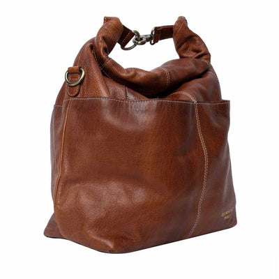 Brown leather handbag on a white background | Yarn Worx