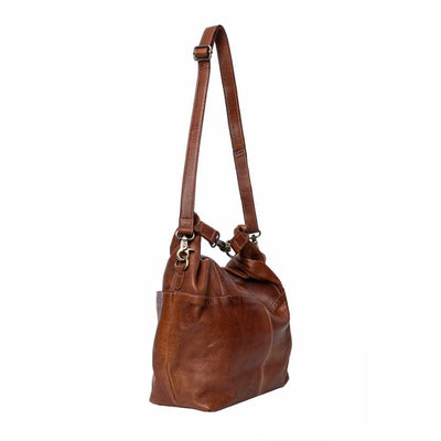 Brown leather handbag on a white background | Yarn Worx