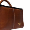 Close-up of a brown leather project bag showing the side panel with white contrast stitching, a black zipper, and gold embossed 'RE-DESIGNED PROJECT' branding on a white background | Yarn Worx