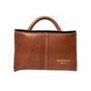 A brown textured leather project bag with a top handle, featuring a vertical centre seam and gold embossed text reading 'RE-DESIGNED PROJECT' on the lower right front panel, set against a plain white background | Yarn Worx