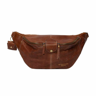 Brown leather waist bag on a white background