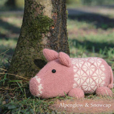 Plum Pudding Knitted Pig Kit Pig-Along shown in colours Alpenglow & Snowcap | Yarn Worx