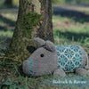 Plum Pudding Knitted Pig Kit Pig-Along shown in colours Bedrock & Ravine | Yarn Worx