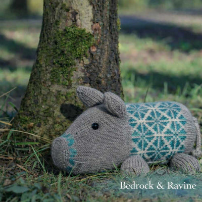 Plum Pudding Knitted Pig Kit Pig-Along shown in colours Bedrock & Ravine | Yarn Worx