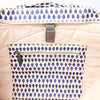 Close-up of a beige bag inside with blue patterned pocket and zipper | Yarn Worx
