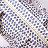 Blue and white patterned fabric with a zipper on a light gray background | Yarn Worx