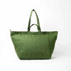 An olive green canvas tote bag with dual top handles, photographed against a clean white background | Yarn Worx
