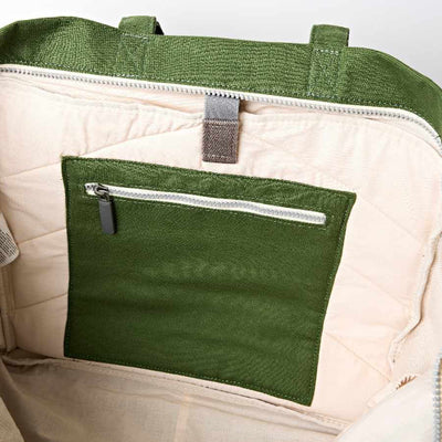 Green pocket on a beige bag showing the inside of the bag with a white background | Yarn Worx