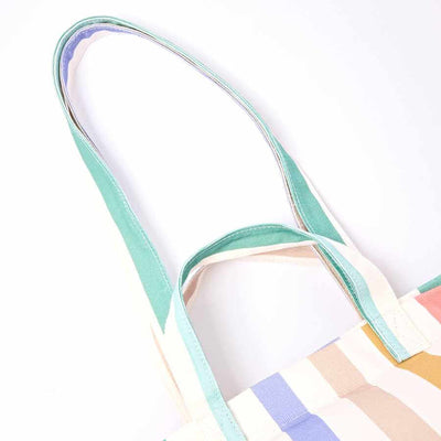 Colorful striped bag with a handle on a white background | Yarn Worx