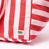 Red and pink striped bag with Roka London label on a light pink background | Yarn Worx