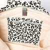 Leopard print inside pocket of the bag with zippers on a beige background | Yarn Worx