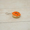 Handmade Polymer Clay Stitch Marker / Progress Keeper - Orange Ghoulish Doughnut | Yarn Worx