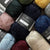 Assorted balls of yarn with Isager labels in various colors.