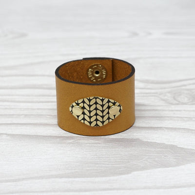 Birdie Parker Designs - Sierra Leather Shawl Cuff - Knit with gold leather and brass medallion | Yarn Worx