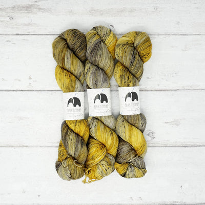Black Elephant Merino Sock Yarn - Concrete & Gold | Yarn Worx