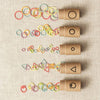 Cocoknits - Flight of Stitch Markers shown out of the box as individual vials | Yarn Worx