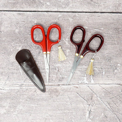 Cohana Lacquer Scissors from Seki shown in red and brown with a leather pouch | Yarn Worx