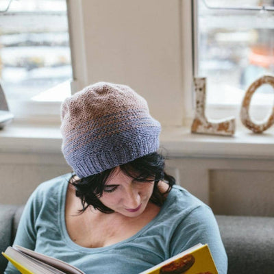The Crochet Project - Crochet Yeah! womain in hat reading | Yarn Worx