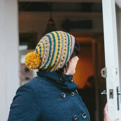 The Crochet Project - Crochet Yeah! woman wearing a bobble hat | Yarn Worx