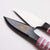 Cohana - Shozaburo Thread Snips with Silk Iga Braid - pink closeup | Yarn Worx